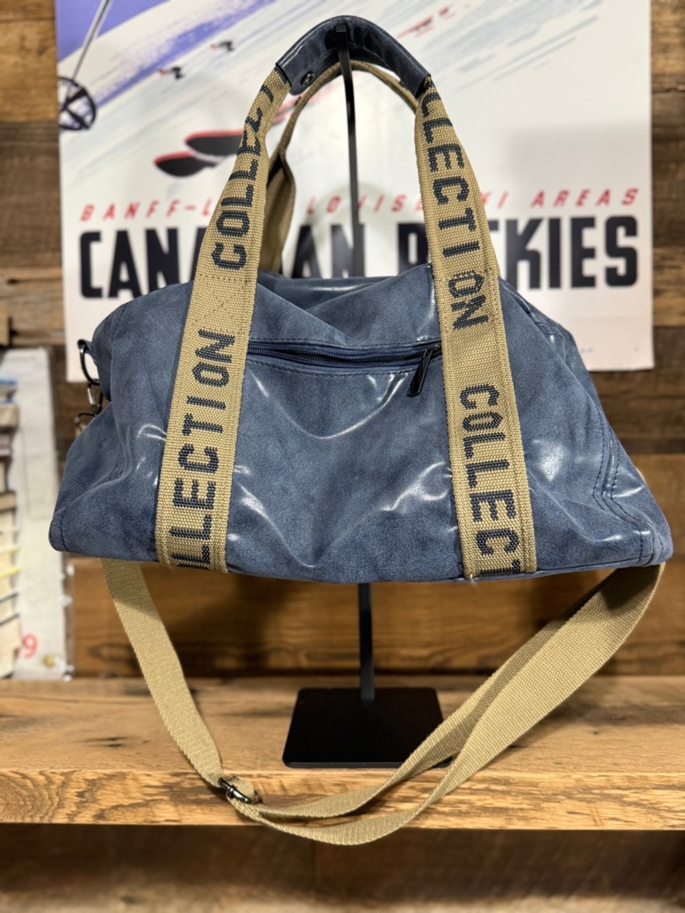 Blue Canvas Duffel Bag with Tan Webbing Straps